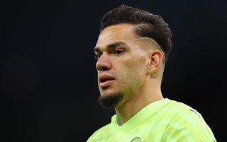 Ederson in action against Sheffield United