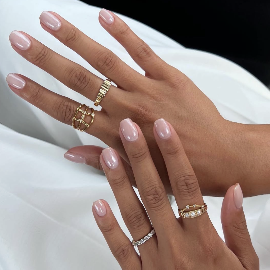 An understated chrome engagement manicure.