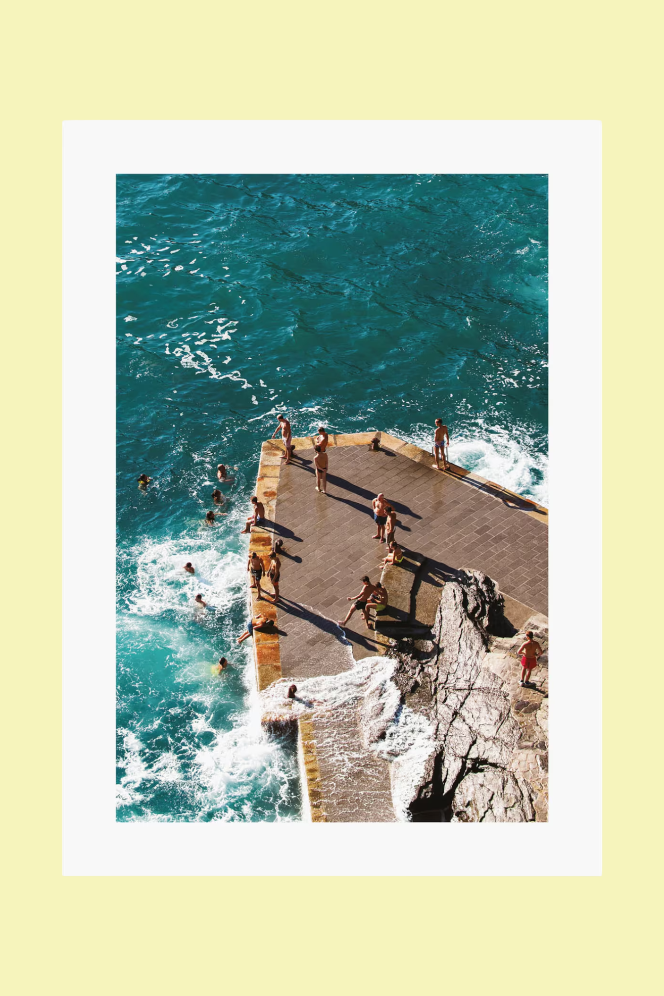 A rocky ocean pier poster