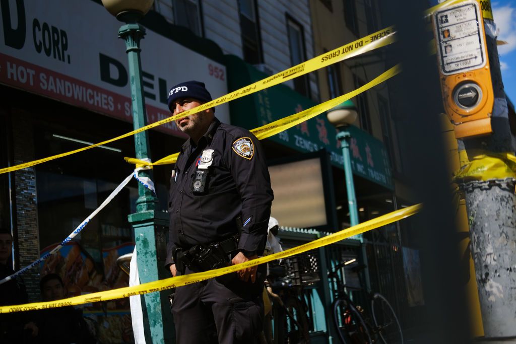 Person of interest in Brooklyn subway shooting 'upgraded' to suspect ...