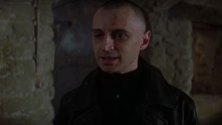 Robert Carlyle speaks while visibly upset in The World Is Not Enough.