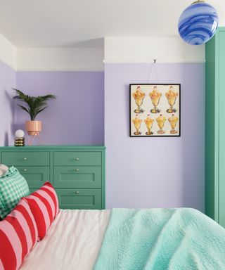 bedroom with colour blocks of green and lavender, ice-cream picture and green and bright pink soft furnishings