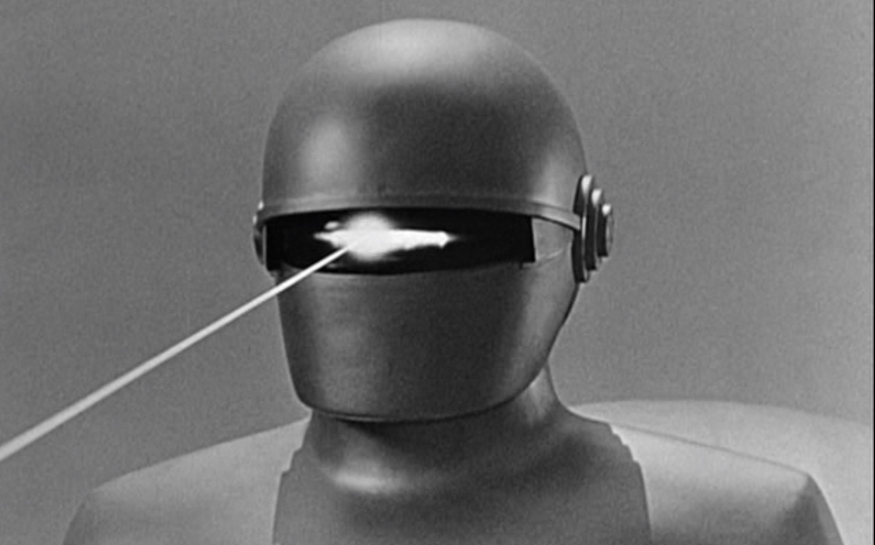 Gort, the robot from The Day The Earth Stood Still, fires a laser beam from his head.