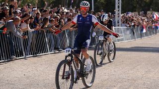 Victor Korektzy celebrating winning the MTB test event