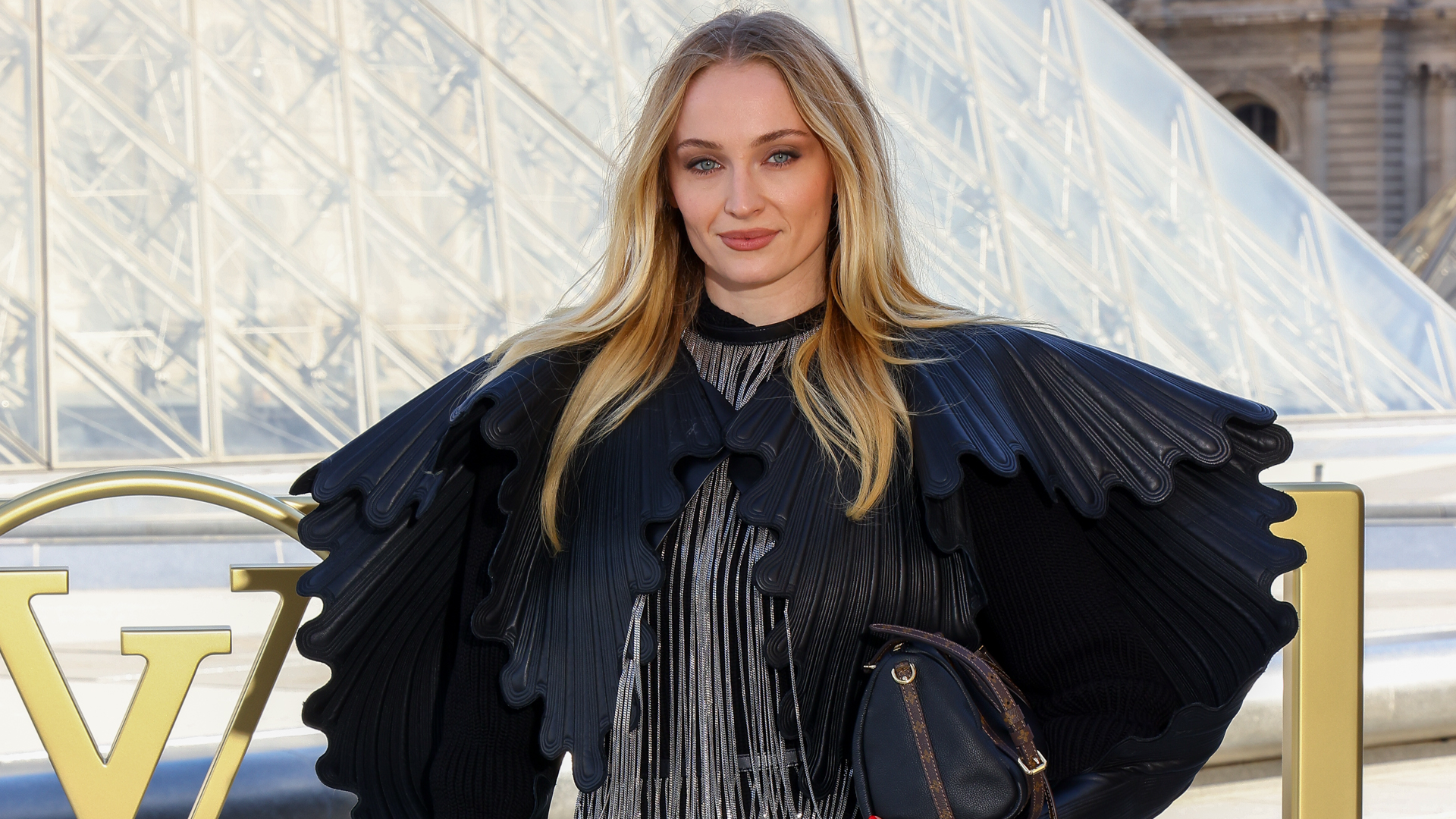 Sophie Turner arrived at the Louis Vuitton Spring 2026 fashion show in fall&#039;s slouchy boot trend 