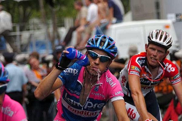 The telltale signs of a hard race: Riders don't even know how to eat and drink any more.