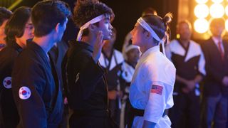 Brandon H. Lee as Kwon, Tanner Buchanan as Robby Keene in Cobra Kai