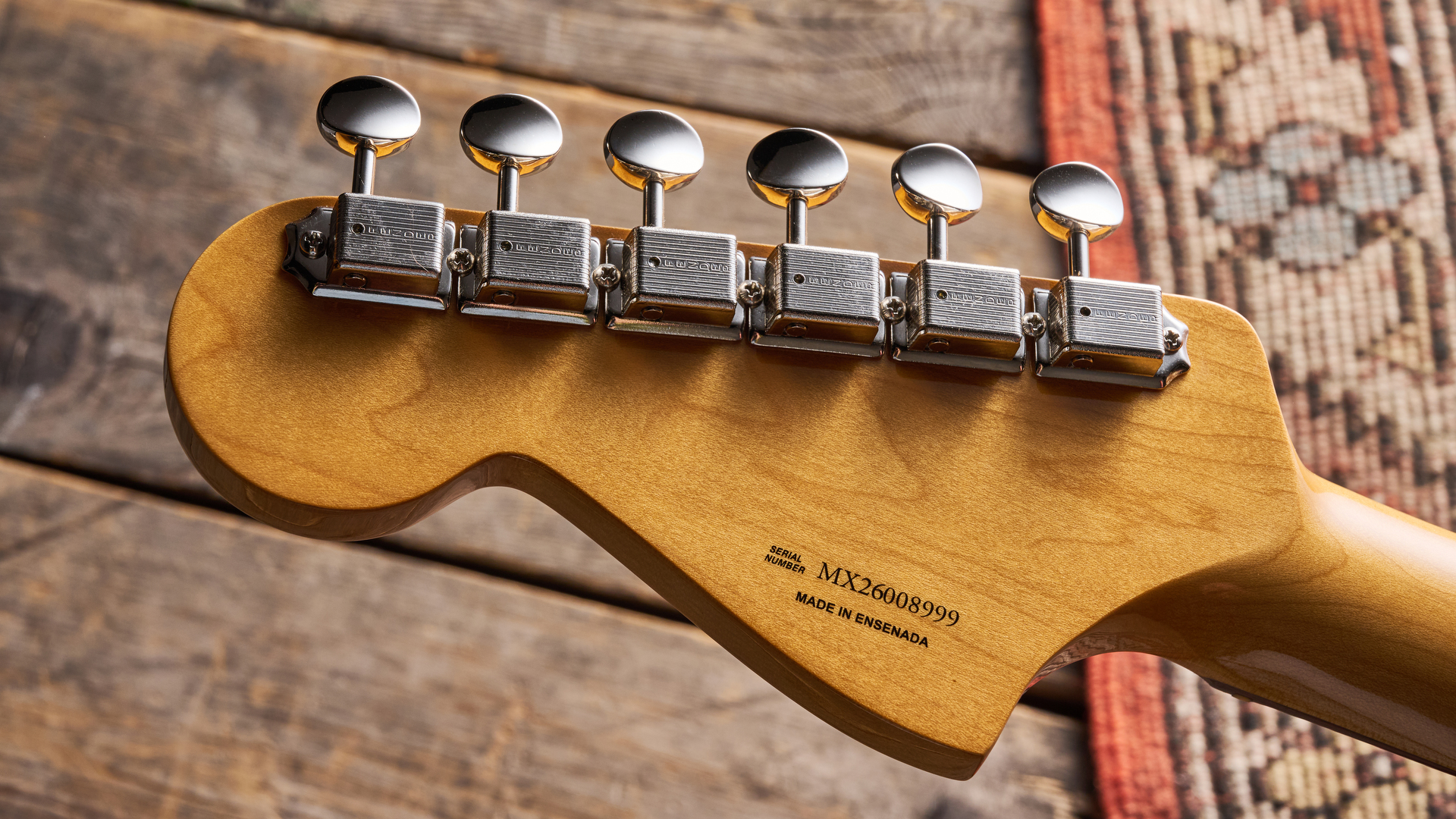 Fender Vintera III Early '60s Bass ​VI in Olympic White with red​ tortoiseshell pickguard.