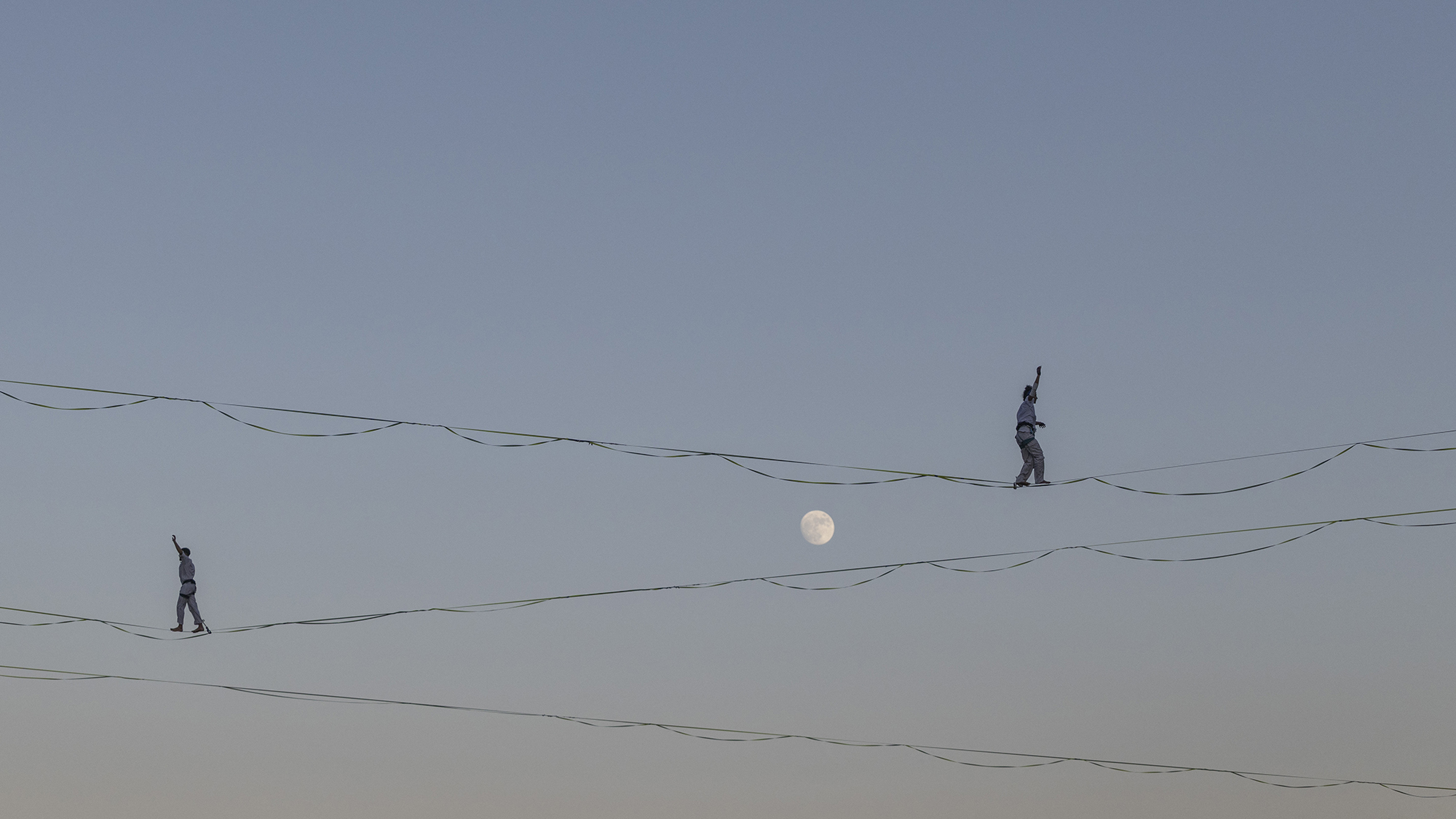 High-wire artists traverse cables suspended above the Hinnom Valley during a dress rehearsal for the 65th Israel Festival in Jerusalem, Israel