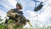 British Army soldier from the Anglian Regiment poses for a press photo as part of a Ministry of Defence (MoD) campaign during a military exercise on Salisbury Plains on July 23, 2020 near Warminster, England 