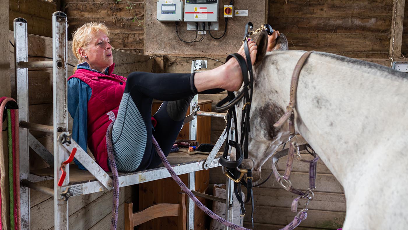 Philippa Verry who was born without arms at home with her endurance horses Stilton and Melitta