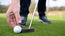 Marking ball with toe of putter