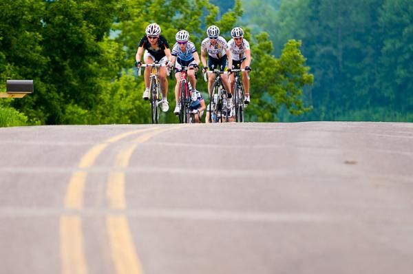 Leah Kirchman (Colavita/Formo d'Asolo p/b Cooking Light) leads the women's break over the final QOM of the day to ensure her lead in that competition.
