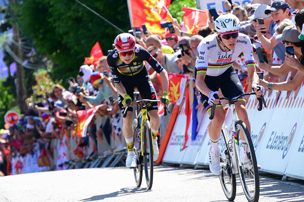 UAE Team Emirate - XRG team's Slovenian rider Tadej Pogacar attacks and Team Visma - Lease a bike team's Danish rider Jonas Vingegaard pursues in the ascent of Rampe Saint-Hilaire during the 4th stage of the 112th edition of the Tour de France cycling race, 174.2 km between Amiens Metropole and Rouen, Northern France, on July 8, 2025. (Photo by Bernard PAPON / POOL / AFP) (Photo by BERNARD PAPON/POOL/AFP via Getty Images)