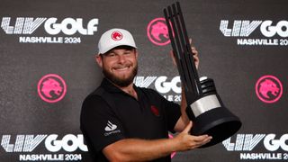 Tyrrell Hatton poses for a photo with the LIV Golf Nashville trophy