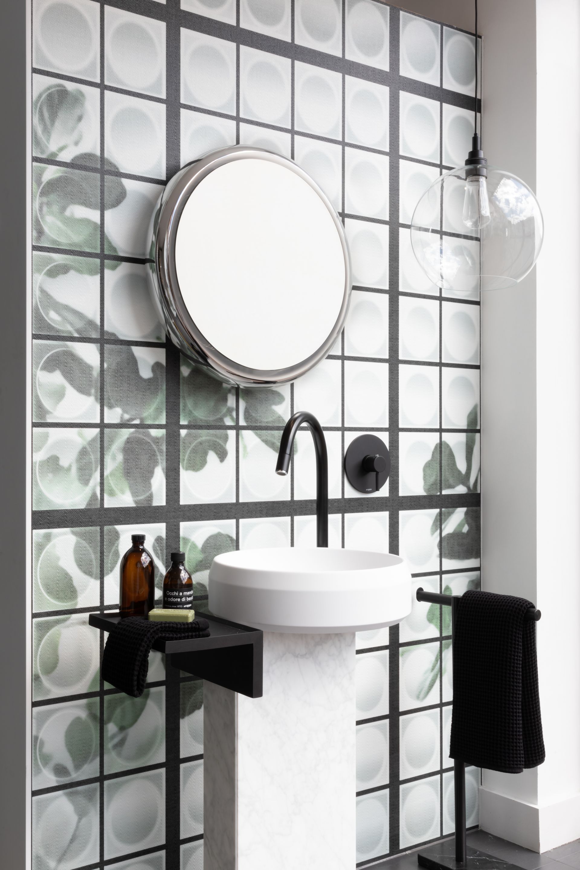 Half bath with mirrored wall