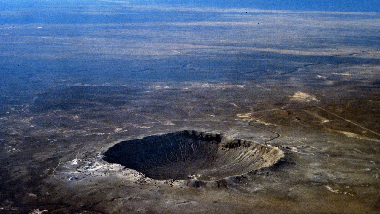 A giant crater sits in the ground