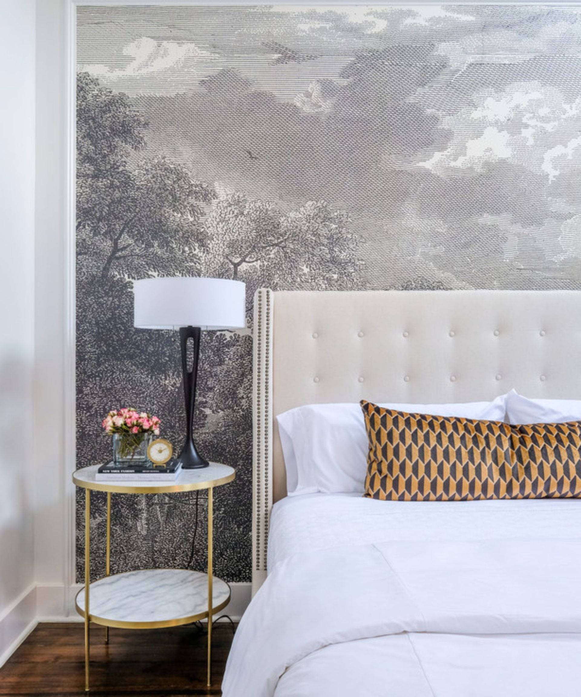 Black and white scenery wallpaper, cream headboard