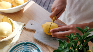 Chopping lemons in the kitchen