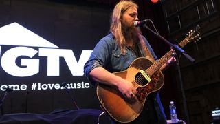 Chris Stapleton performs at HGTV'S The Lodge At CMA Music Fest - Day 3 on June 8, 2013 in Nashville, Tennessee