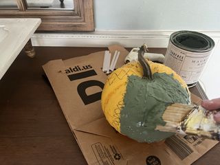 painting pumpkin green
