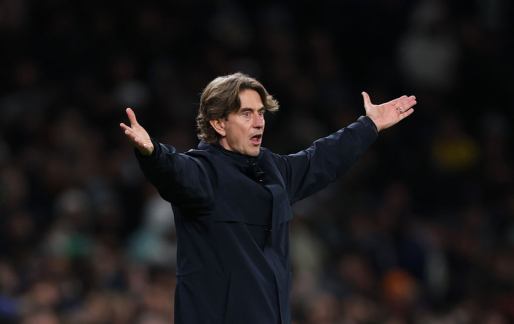 Tottenham manager Thomas Frank holds his arms out in frustration