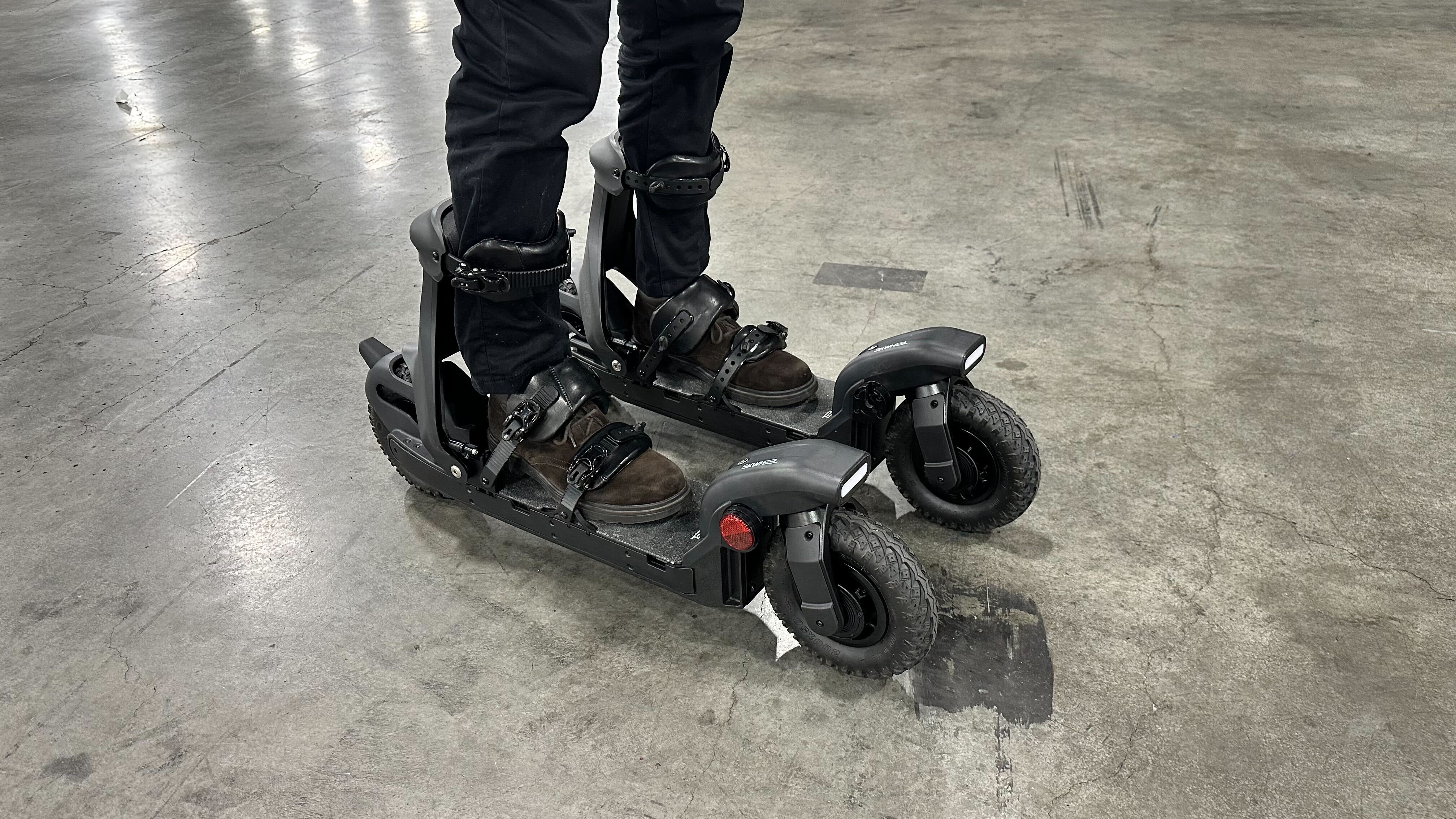 A person riding the Skywheel motorized skis
