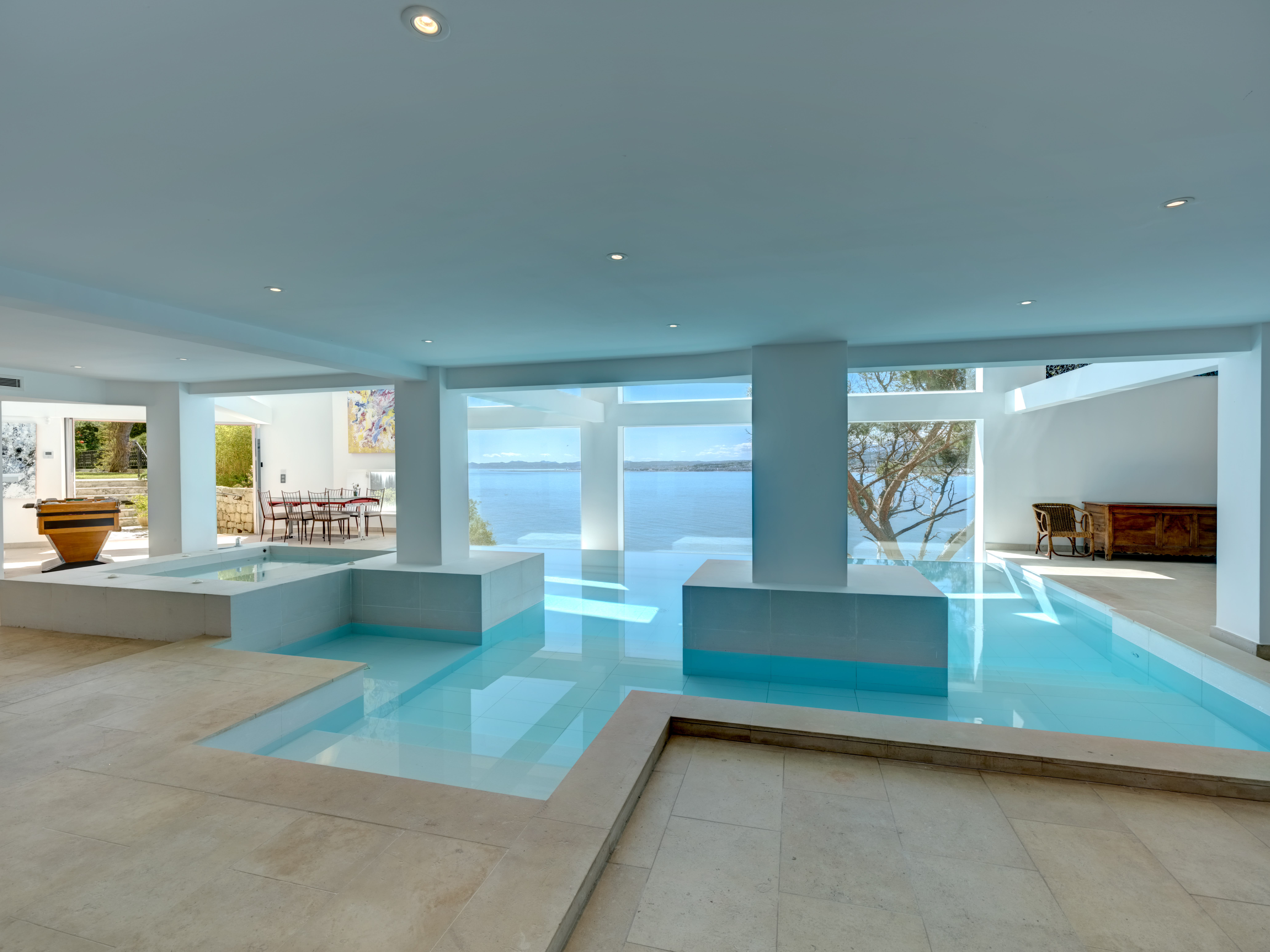 An indoor infinity swimming pool.