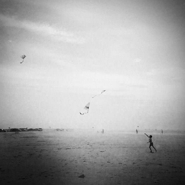 Flying a kite on the shores of Washington state.