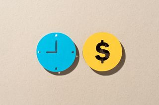 Clock and dollar sign for tax payment deadline