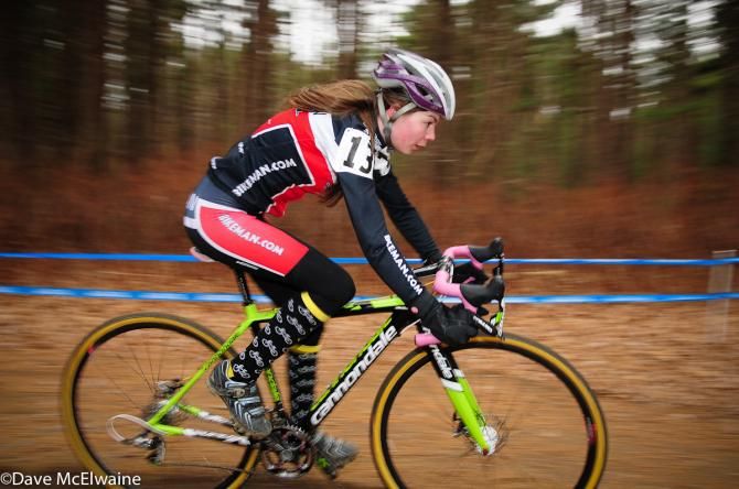 Melissa Seib (Bikeman.com) riding in the woods with one lap to go