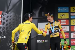 PLATEAU DE SALAISON FRANCE JUNE 12 LR Race winner Primoz Roglic of Slovenia and Team Jumbo Visma Yellow Leader Jersey and Jonas Vingegaard Rasmussen of Denmark and Team Jumbo Visma on second place pose on the podium ceremony after the 74th Criterium du Dauphine 2022 Stage 8 a 1388km stage from SaintAlbanLeysse to Plateau de Salaison 1495m WorldTour Dauphin on June 12 2022 in Plateau de Salaison France Photo by Dario BelingheriGetty Images