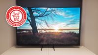 A picture of the Samsung S85H showing a sunny marsh, with the Deals of the Week logo overlaid