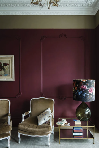 how to decorate large walls with dark red and a datum line