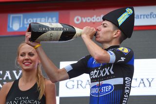 David de la Cruz (Etixx-Quickstep) drinks in victory