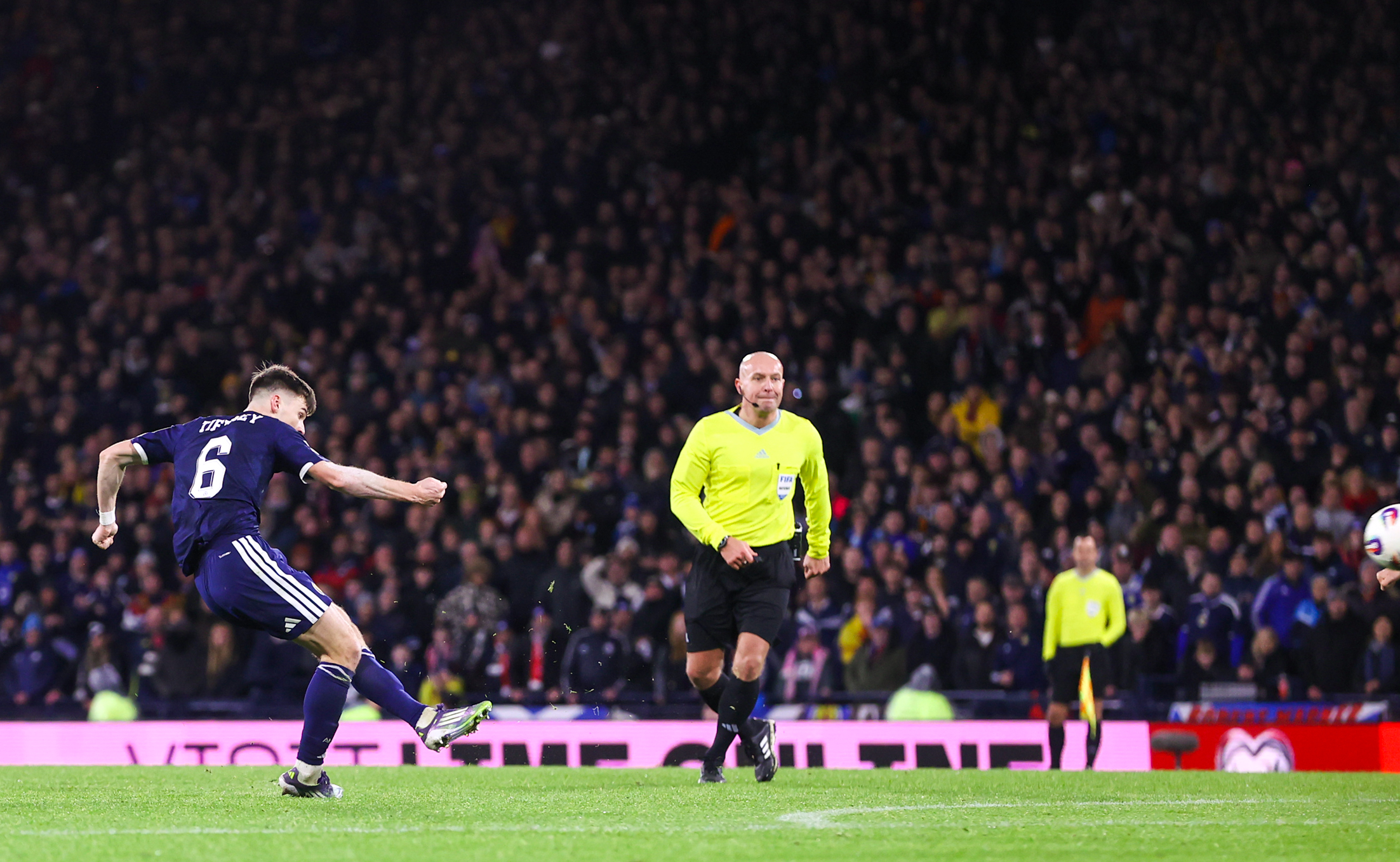 GLASGOW, SCOTLAND - NOVEMBER 18: Scotland&amp;rsquo;s Kieran Tierney scores to make it 3-2 during a FIFA World Cup 2026 Qualifier between Scotland and Denmark at Hampden Park, on November 18, 2025, in Glasgow, Scotland. (Photo by Craig Williamson/SNS Group via Getty Images)