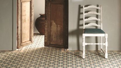 Clean encaustic floor tiles flooring in a hallway