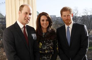 Prince William, Kate Middleton, and Prince Harry pose together in 2017.