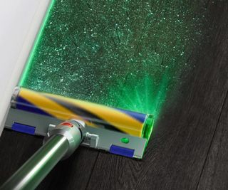 A Dyson V15 Detect using lasers to illuminate hidden dust.