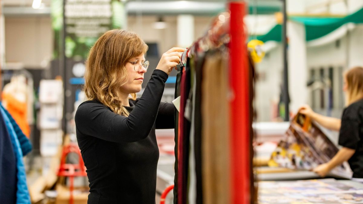 Woman working at United Repair Centre