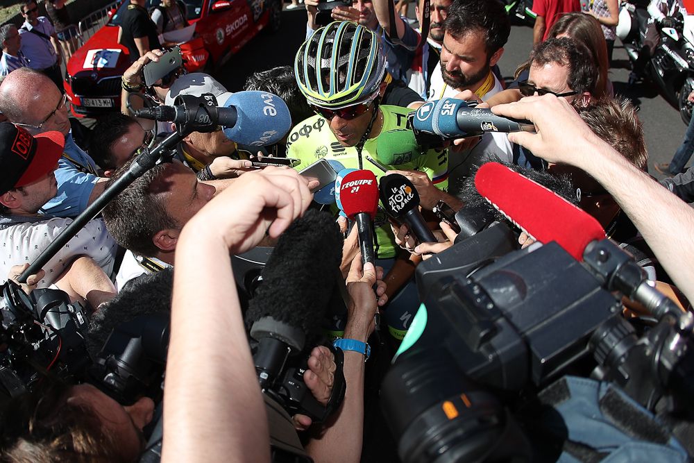 Alberto Contador gathers a throng of media after stage 5.
