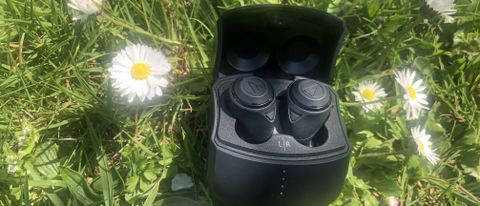 the ath-cks50tw true wireless earbuds in their charging case