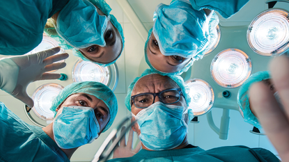 Looking up at some surgeons © Getty Images