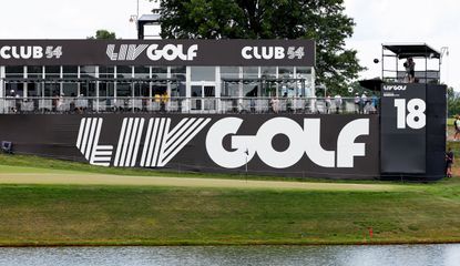 A LIV Golf logo behind a golf green