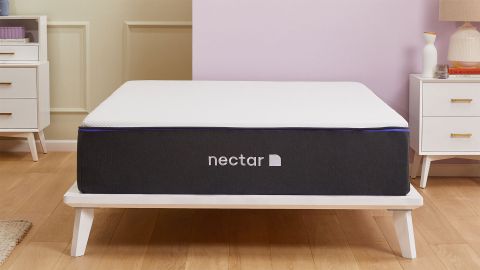 Press shot of the Nectar Premier Hybrid mattress in a bedroom