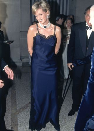 Princess Diana wearing a navy slip dress by John Galliano for Dior to the Met Gala 1995