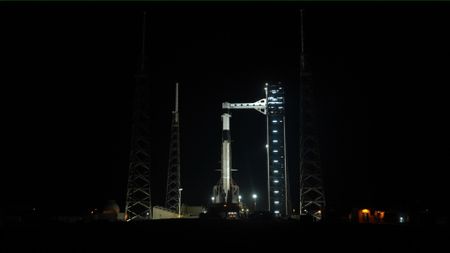A SpaceX Falcon 9 rocket with the company’s Dragon spacecraft on top stands vertical on the launch pad at Space Launch Complex 40 at Cape Canaveral Space Force Station in Florida on Friday, Feb. 13, 2026, ahead of NASA’s SpaceX Crew-12 launch.