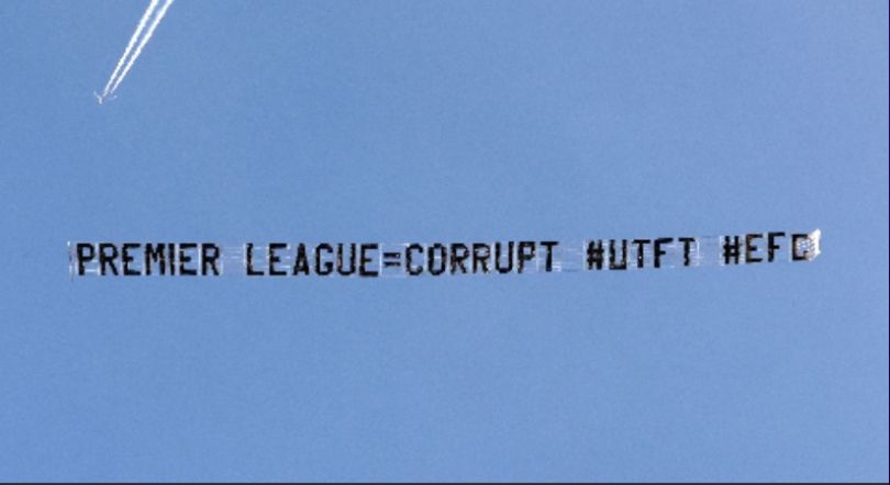 Everton fans fly a banner over the Etihad during the Manchester City-Liverpool game to protest against their recent points deduction.