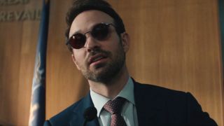 Charlie Cox as Matt Murdock in Daredevil: Born Again. He's talking while sitting in a courtoom.