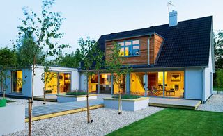 A 1970s bungalow has been transformed in to a modern, open plan home with a contemporary remodel and extension